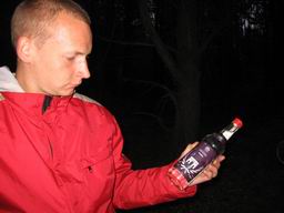 Андрей Батраков и бутылка водки, подаренная нам белорусами